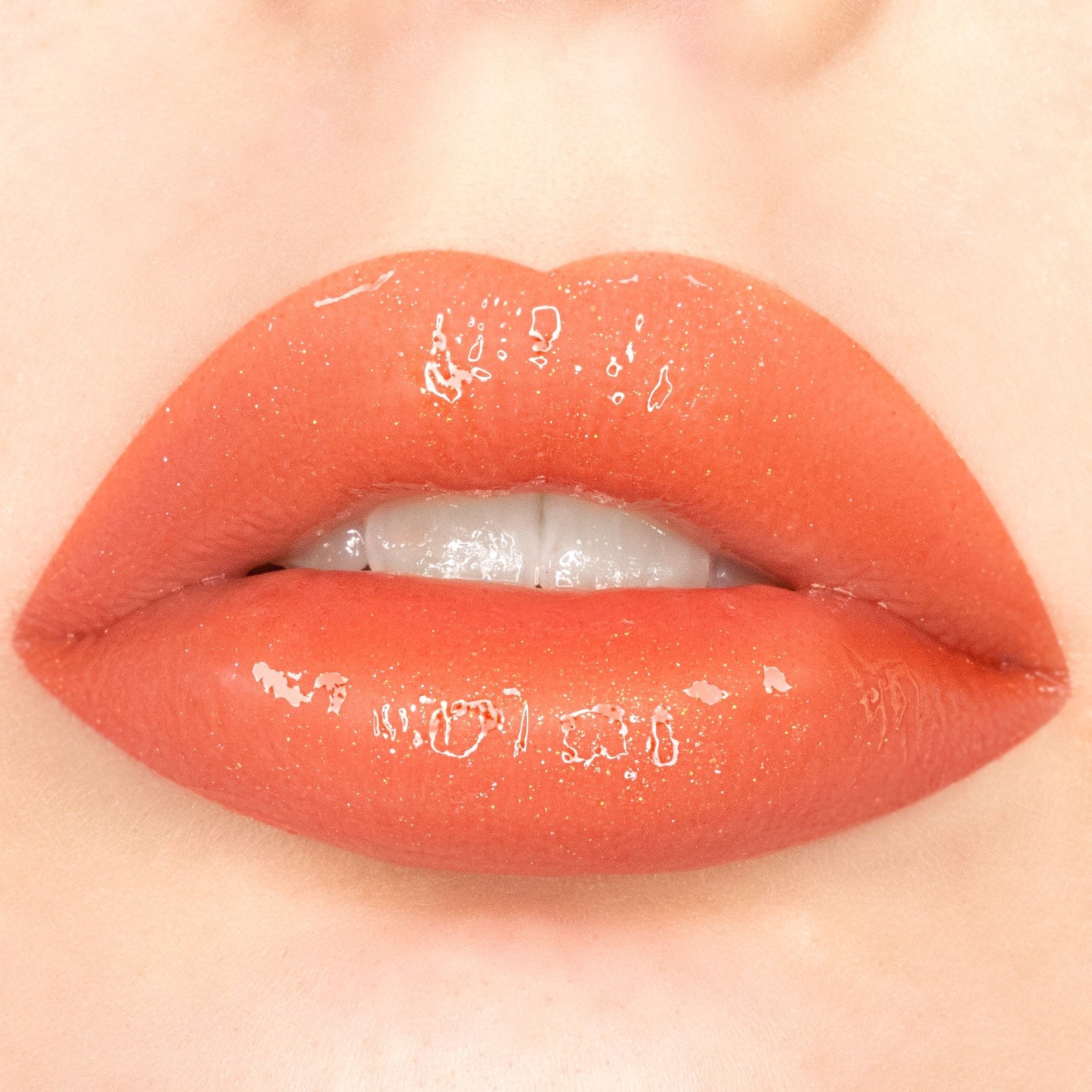 Amor US - Sleeky Kiss Plumping Lip Gloss Tan Orange